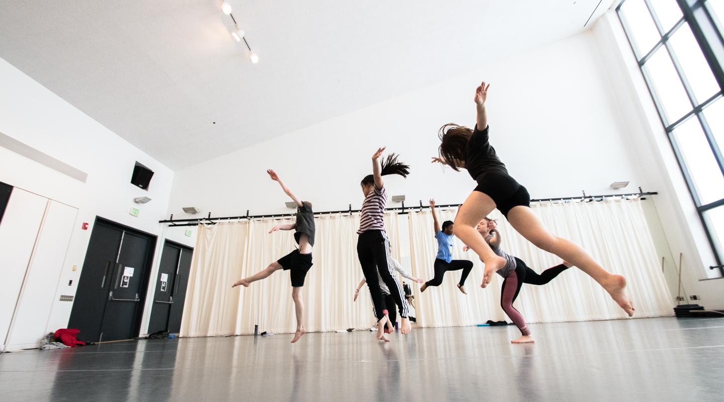 Dance students dancing in Miller Performing Arts Center